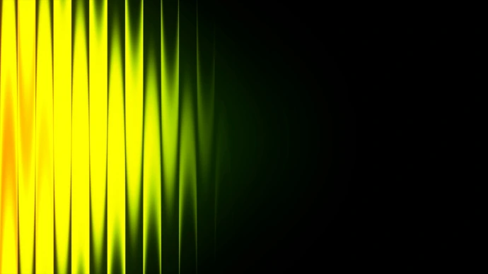 Vertical yellow and green light streaks on black background